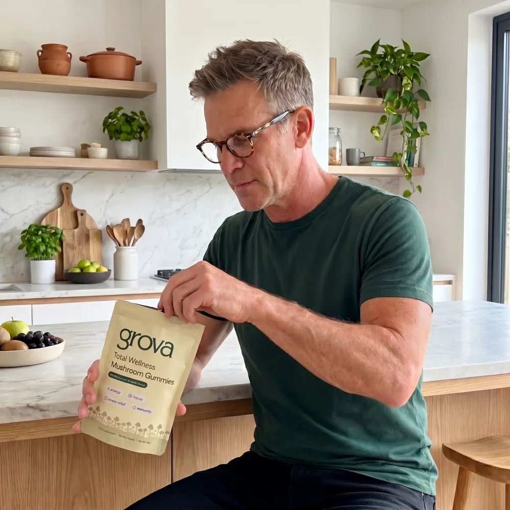 Grova customer opening a pouch of mushroom gummies
