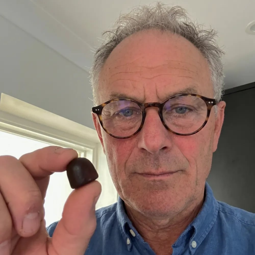 Grova customer holding Daily Wellness Mushroom Gummies